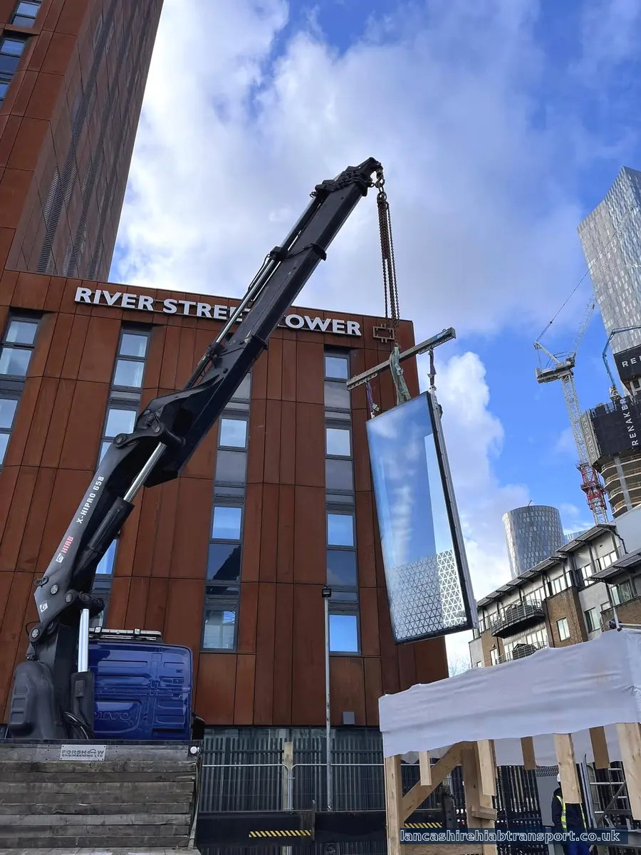 Long-reach Hiab lifting capability across Lancashire and the North West Long-reach Hiab crane lifting in Manchester